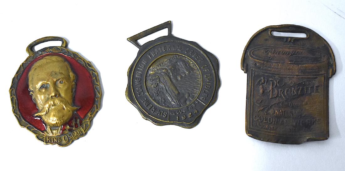 Watch Fobs. Bronzite , 1864 King Oscar & Orioles (3): Bronzite Colonial Works, Brooklyn and Chicago ; Supreme Benevolent Order of Orioles, 1924; King Oscar , J.C. Herman & Co. Harrisburg, Pa. Est. 1864 (Three in the lot)
