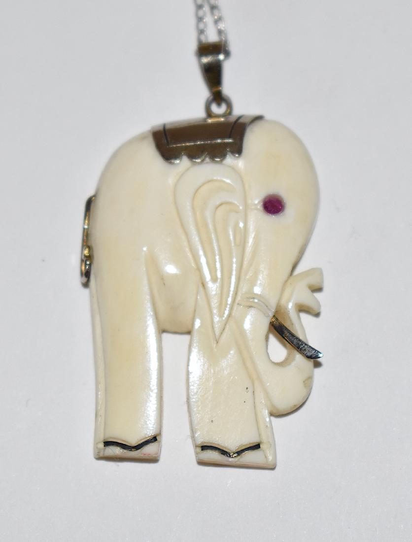 Carved Elephant Pendant . Sterling Chain. Ruby Eye (1 of 2)