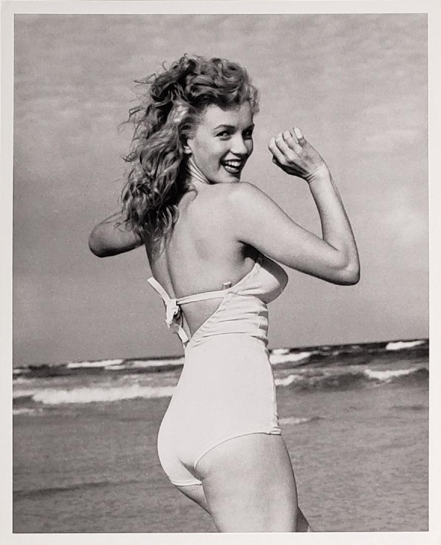 Marilyn Monroe Original Andre DeDienes Photo: Marilyn Monroe original Andre DeDienes 8" x 10" photograph. This photograph of Marilyn was taken in 1945 but reprinted in 1979. A stunning portrait that shows a Marilyn on the beach having fun. It com