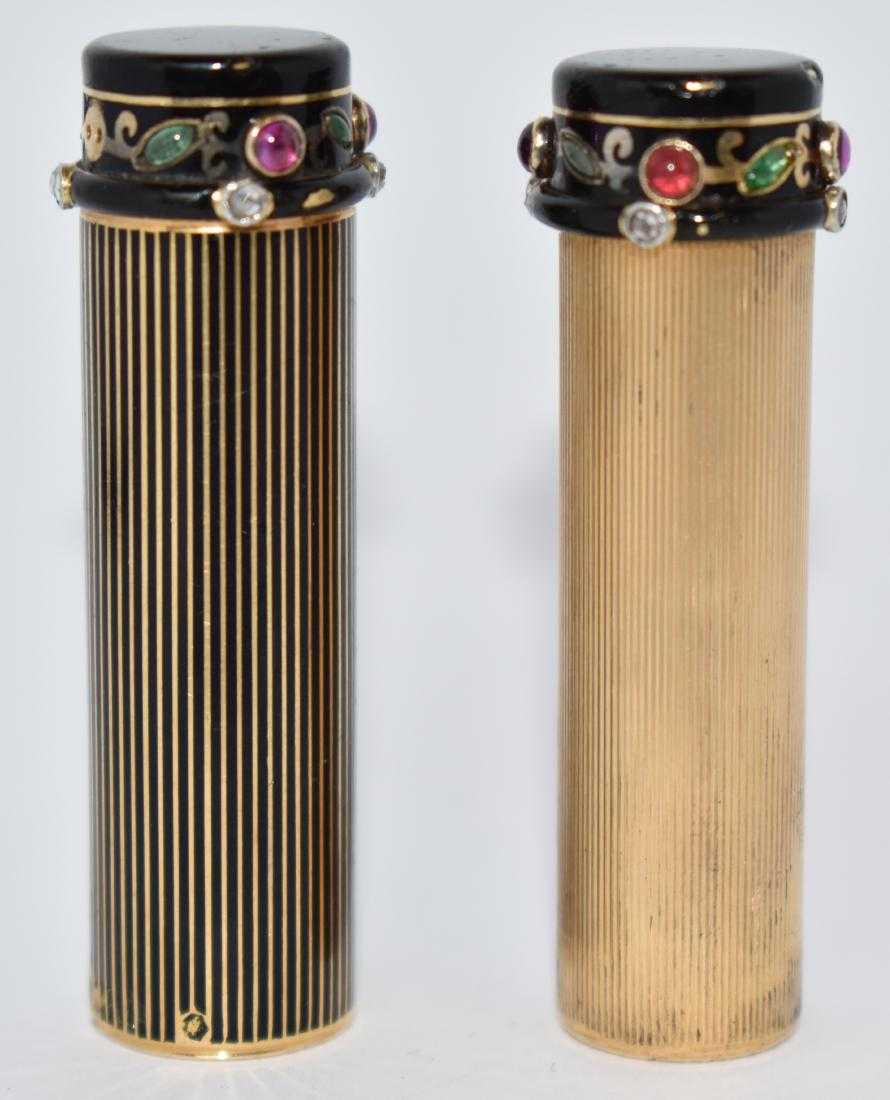 Cartier 18K Gold Ruby & Diamond Lipstick Case: Cartier 18K Gold lipstick case mounted with rubies and diamonds. 23 pennyweights, Enameled case has rubies, diamonds and sapphire mounts. Marked Cartier 18K Paris Made in France. Numbered 6165 2"L whe