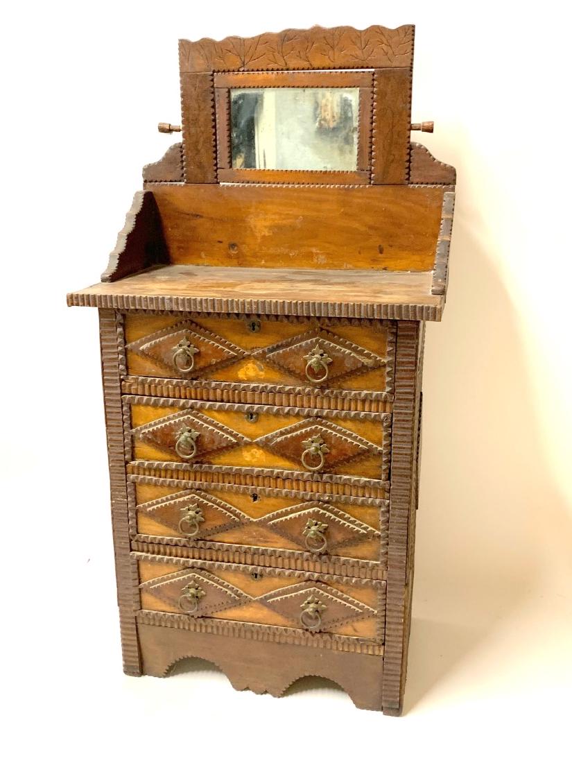 Rare American Tramp Art Mirrored Child's Dresser: Highly decorated Tramp Art wood child's dresser. Four(4) drawer and mirrored top; 35.5in.H. x 18in.W. x 11in.D.