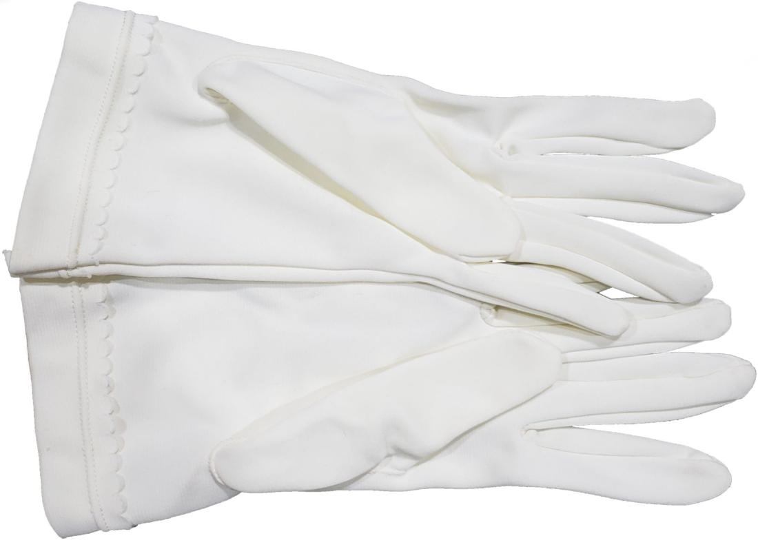 Princess Diana Personally Worn Gloves: Princess Diana's personal cotton gloves labelled with the ÒSÓ Spencer logo. There is aging to the label inside and the gloves are a little worn which is to be expected due to the age, out of the 2 p