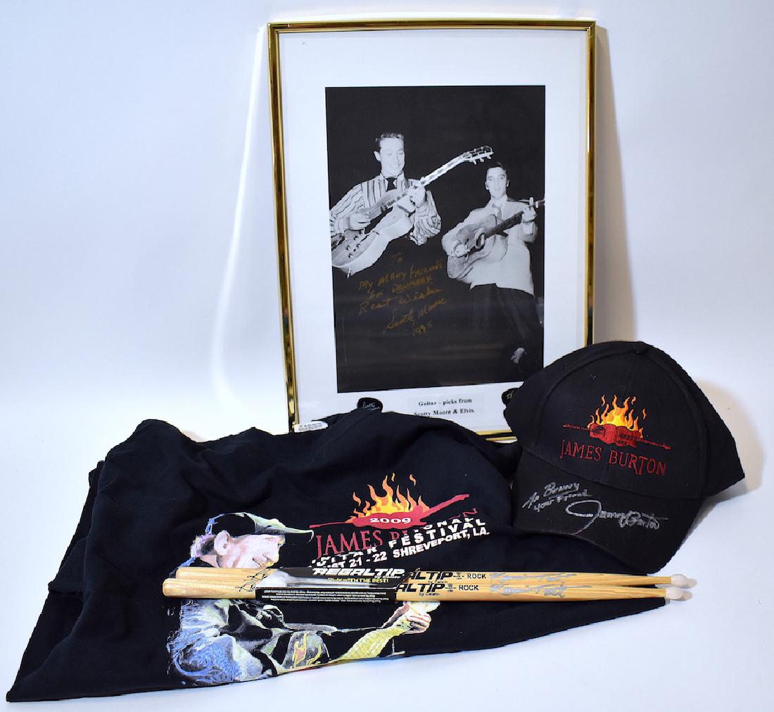 Elvis Band Members Memorabilia. Autographed: Included in the lot are four signed pcs. of band member memorabilia to include a James Burton branded cap signed in silver ink " To Beny Your Friend James Burton. The lot contains two drumsticks , eac