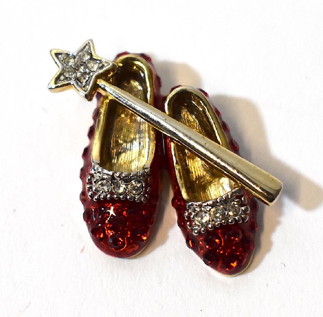 Wizard of Oz Red Ruby Slippers and Wand Brooch: Gold tone pin featuring the iconic symbols of the Wizard of Oz 1"