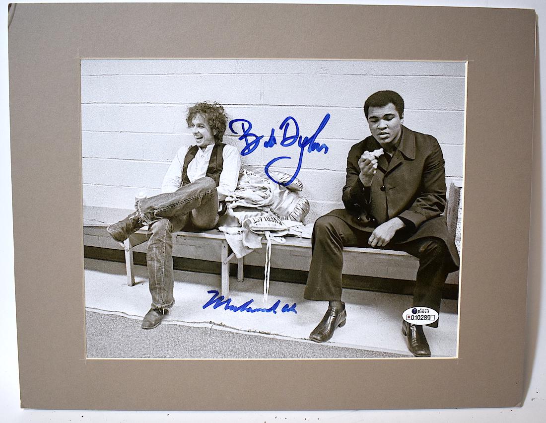 Rare Bob Dylan Muhammad Ali Autographed Photograph: Rare Muhammed Ali Bob Dylan autographed photograph by both. With an accompanying certificate of authenticity Matted to 11 x 14.