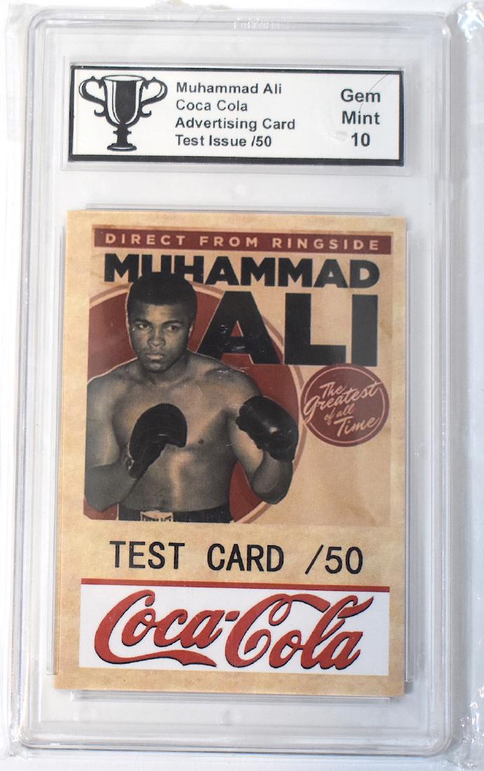 Muhammed Ali Coca Cola Test Card: Muhammed Ali Coca Cola ADvertising Card. Test Issue /50. Graded 10. The Champ at the front, "Greatest of All Time" The Product at the back Big King Size 28/50. Encased in hard plastic protective case.