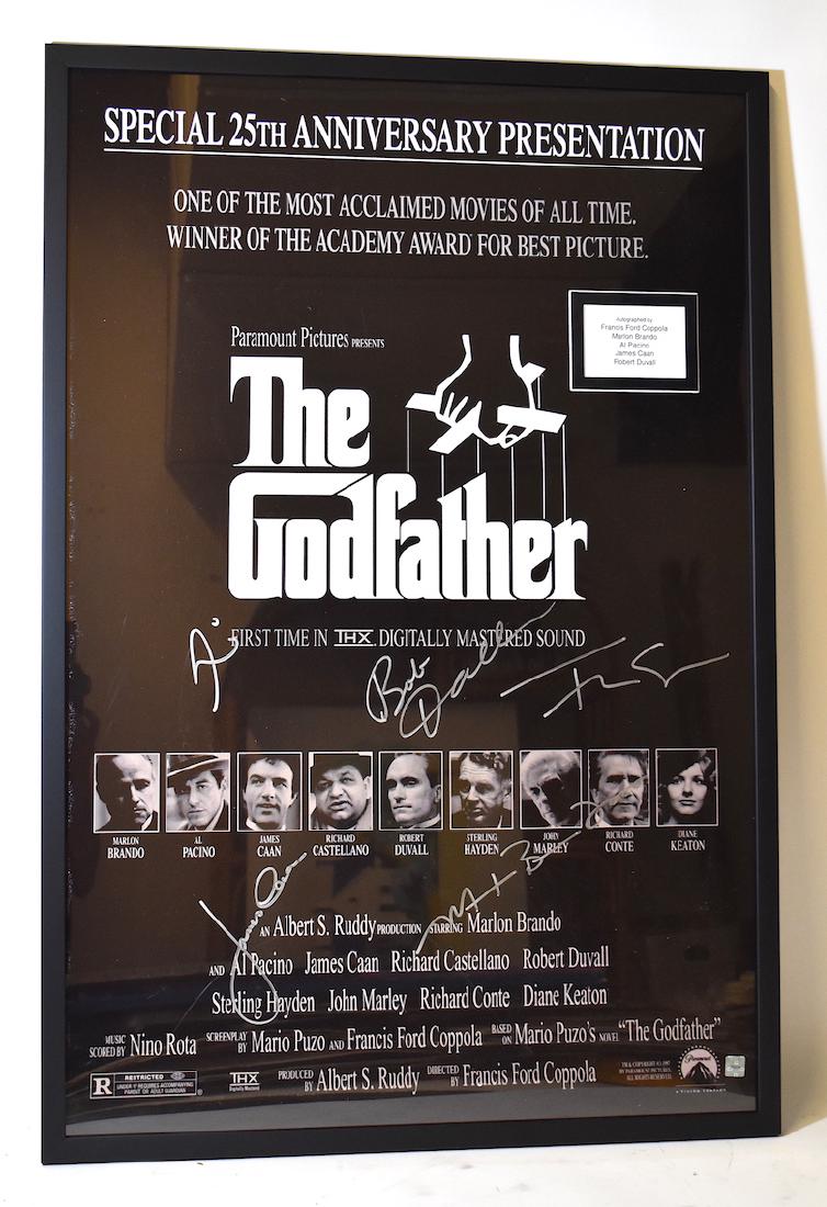 Movie Poster. Godfather. Signed by Brando, Caan,Pacino: The Godfather Movie Poster. Signed Marlon Brando, James Caan, Al Pacino, Robert Duvall and Francis Ford Coppola. 41 1/2"H. x 28 1/4"W.