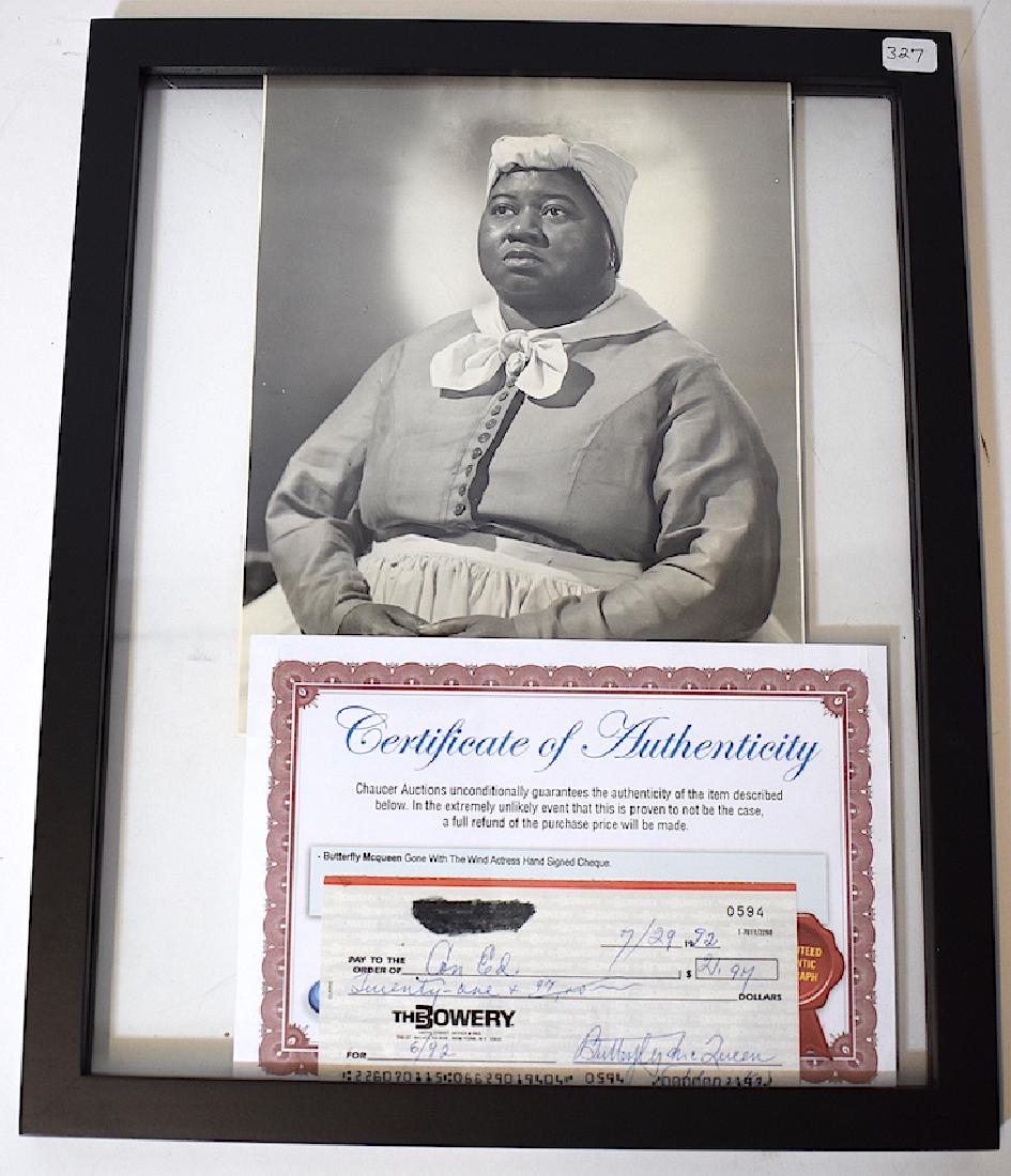 Butterfly McQueen Sgd. Check . Photograph: A Butterfly McQueen signed check, July 29, 1992 made out to Con Ed for $21.97 cents and drawn on The Bowery bank in NYC. with a certificate of authenticity from Chaucer Auctions. It is framed with a v