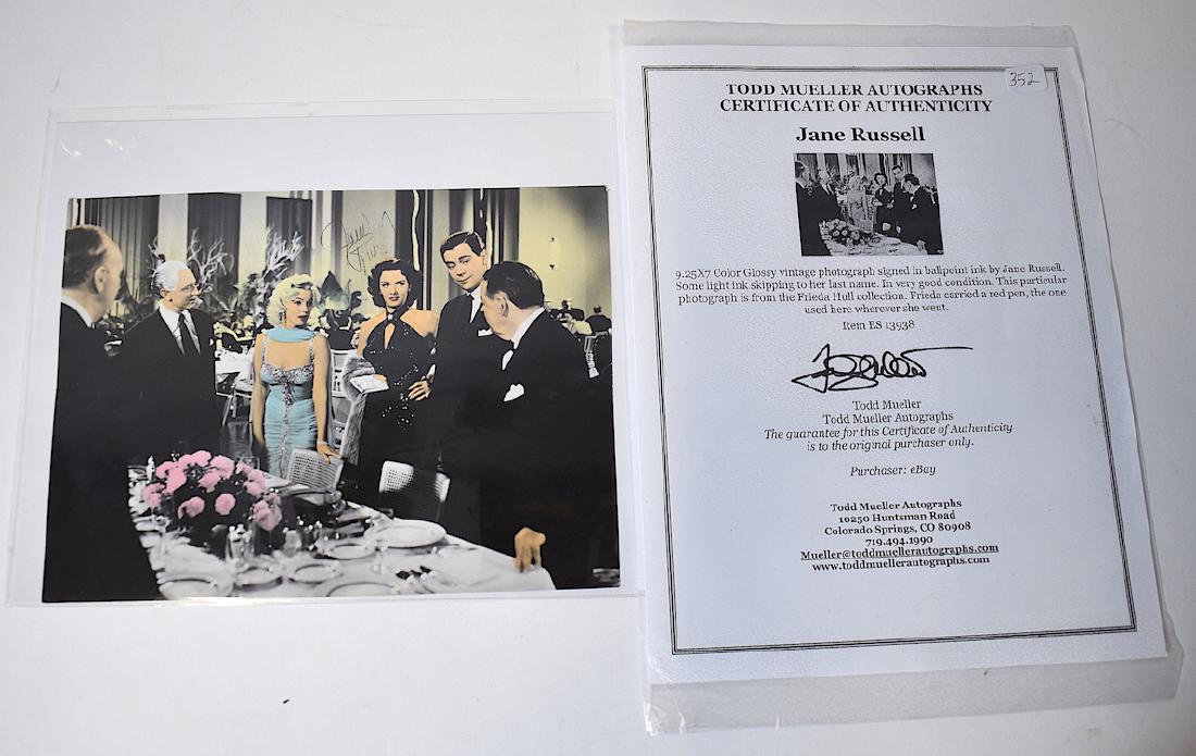 Vintage Photograph Sgd. by Jane Russell.: With Marilyn Monroe. Color. Sgd. in ballpioint ink. Some light ink skipping to last name. Good condtion. From the Frieda Hull collection. Ms. Hull was known to carry a red pen, the one used here, wher