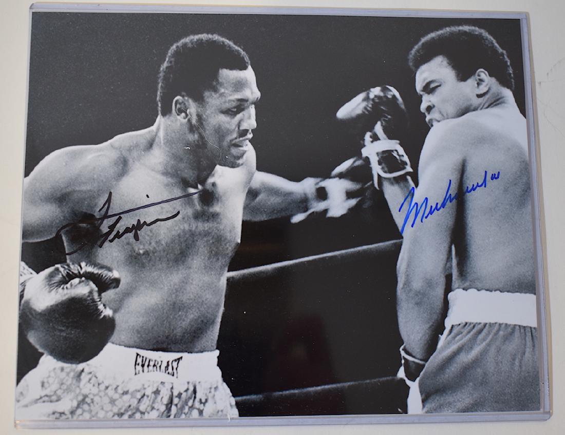 Muhammed Ali Joe Frazier Autographed Photo: Signed by both in blue ink. 8 x 10 With certificate of authenticity.