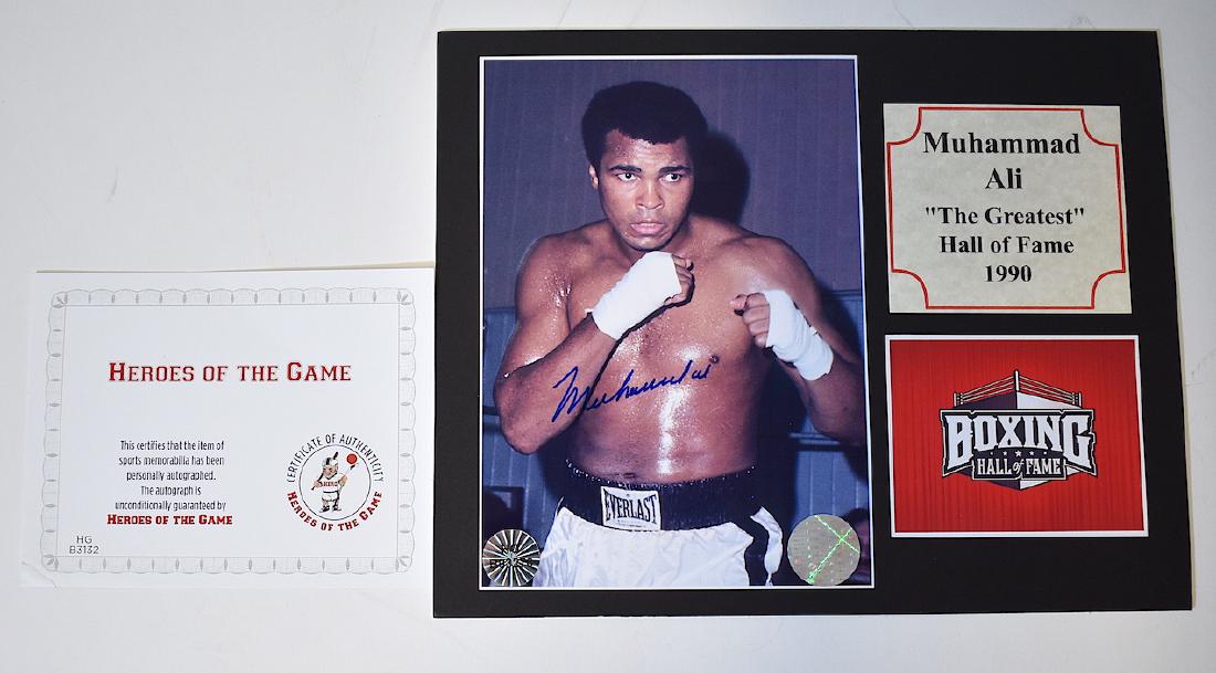 Muhammed Ali Autographed Photograph: From the Boxing Hall of Fame. 1990 Photo is 7 1/4" x 5" and overall size is 8 x 10