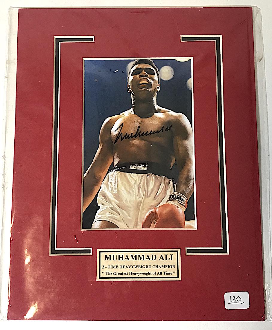 Muhammed Ali Signed Photograph: With certificate of authentication that the autograph was personally signed by Ali. Size 5"X4" photo. Overall 10"X8"