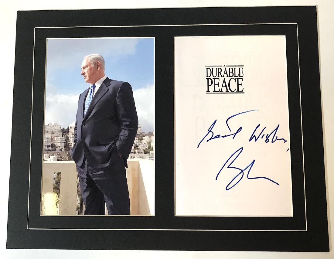 Benjamin Netanyahu Photo and Autogrraph: Matted together a photograph and an autograph on Durable Peace Title Page. Best Wishes Benjamin Netanyahu. Overall size 11 x 14