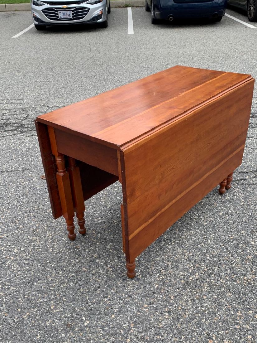 19thC. American Cherry Drop Leaf Table: American cherry drop leaf gate-leg table; 30in.H. x 44in.W. x 19.5in.D. x 63.5in.(opened)