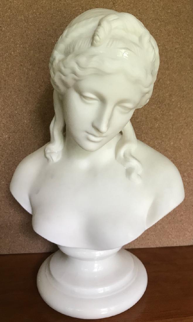 Belleek Parian China Bust of Sorrow: Lovely Belleek parian china Bust of Sorrow. This china bust is finished in cream / ivory glaze in both matt and gloss. Green Belleek markings at underside of the base. 11-1/4" H.