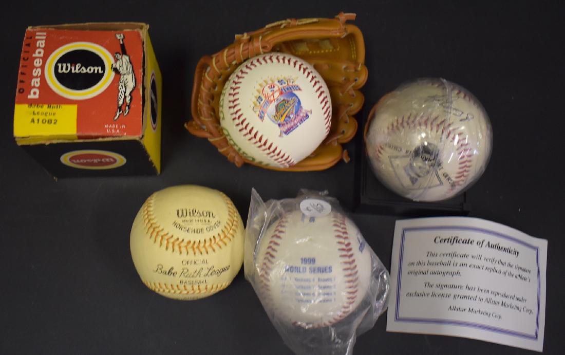Baseball Collector's Lot: Multiple Lot to include Ken Griffey Jr. Ball with replica signature; also included is a 1996 World Series Champs Ball in Glove for New York Yankees with stats; an Official Babe Ruth League baseball by