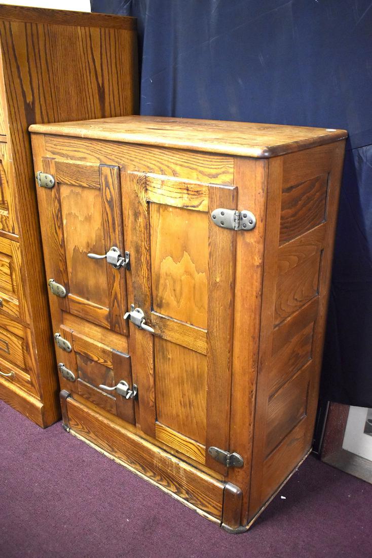 Antique Oak Ice Box: Three drawer. Paneled Sides Patent Plaque at the back with dates for 1911-1919 41"H. x 31"W. x 17"D.