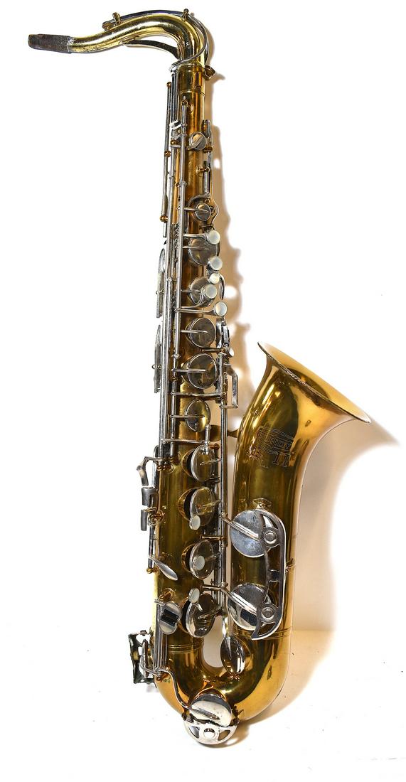 Vintage Brass Saxophone Bundy2 Selmer Co.: Mother of pearl keys. 32"H.