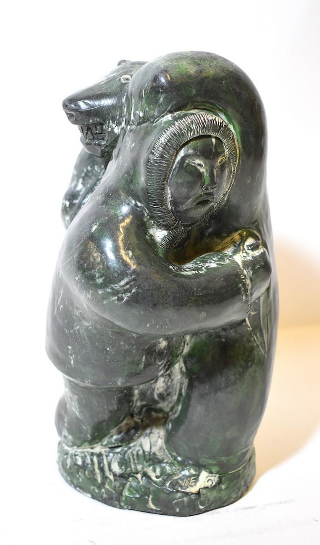Inuit Carving. Eskimo and Bear.: Eskimo Figure with Bear. 10"H.