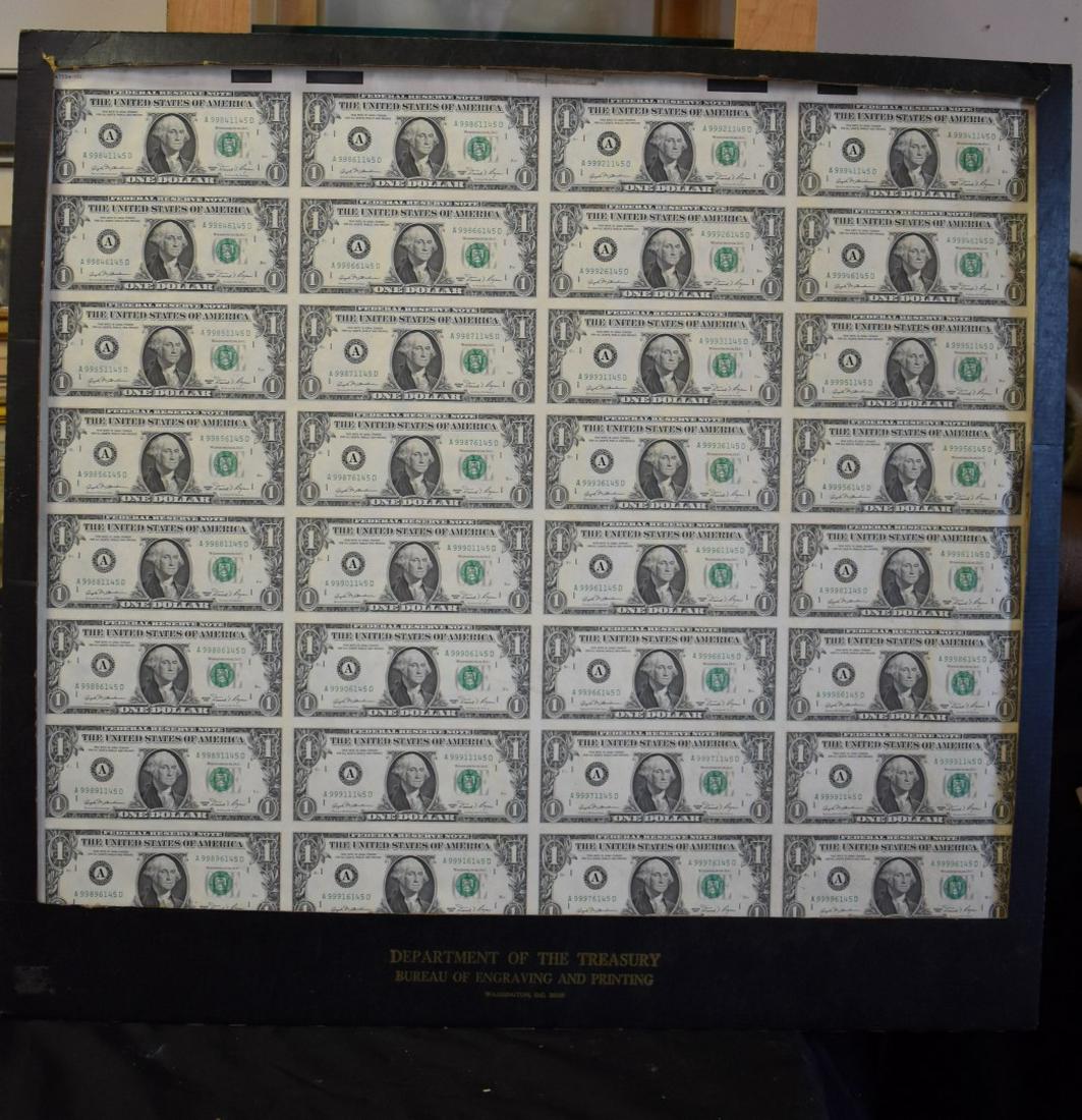 1981 Department of the Treasury $1 Uncut Sheet: 1981 Uncut sheet of thirty-two(32) 1.00 bills. In a framed cardboard stamped Department of the Treasury Bureau of Engraving and Printing Washington, D.C. 20228; 24.5in. X 26in.(overall)