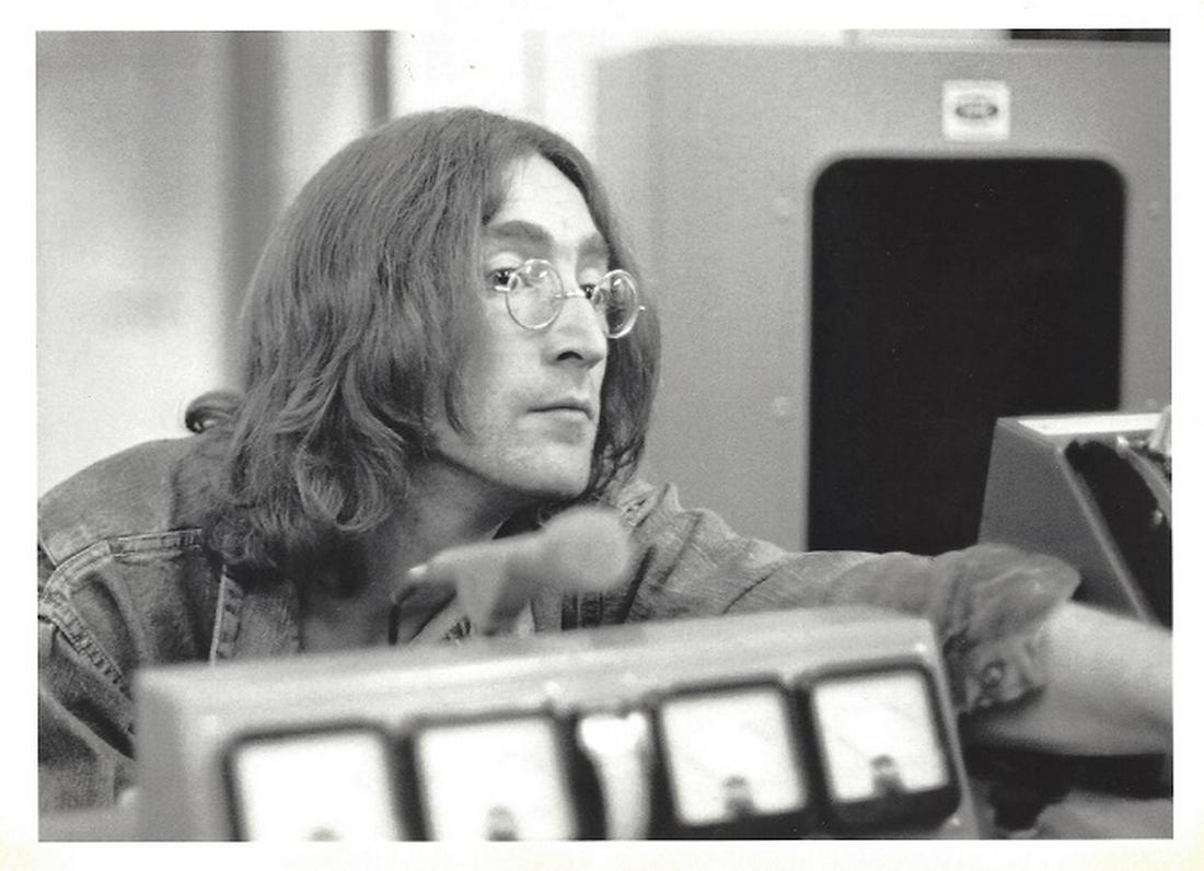 John Lennon Original Linda McCartney Press Photo: John Lennon, 7" x 5" press photo. It comes stamped by the photographer, Linda McCartney, with other details for publicity, taken in 1969 and printed in 1988. The photograph is printed on double weight