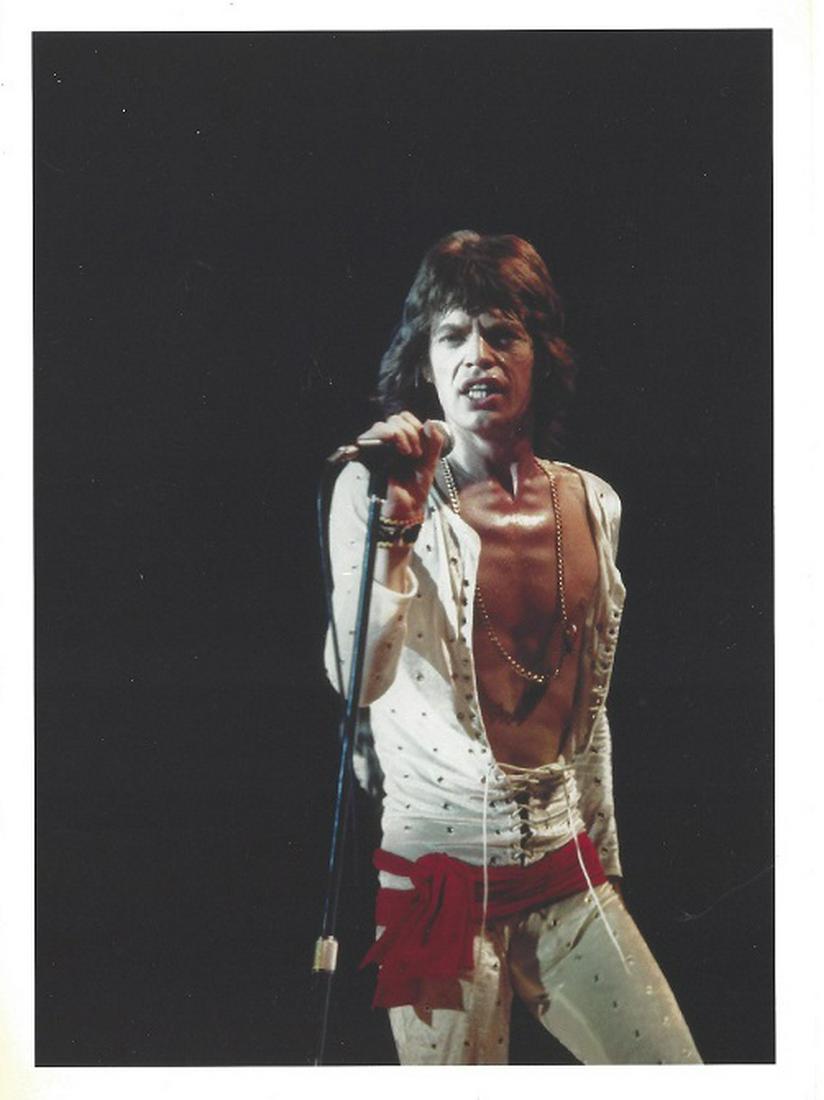 Mick Jagger Original Jim Marshall Press Photo: Mick Jaggar, 7" x 5" press photo. It comes stamped by the photographer with other details for publicity, taken and printed in 1992. The photograph is printed on double weight semi-gloss paper and is i