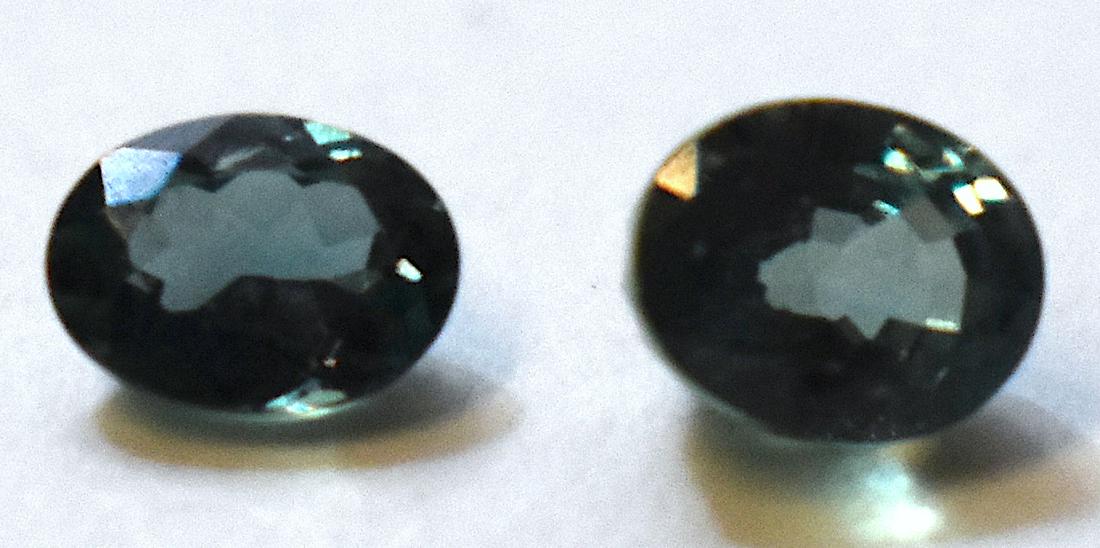 Russian Alexandrite.Stones 0.38 Carats and a Second: Oval faceted. 0.38 carats. Moderately included (M1) SI-1 Color Change: Very Good. Color: vstbG(17) 6/4 Medium, dark. Moderately Strong, very strongly bluish Green rP (28) 6/3-Medium dark, Very Slightl