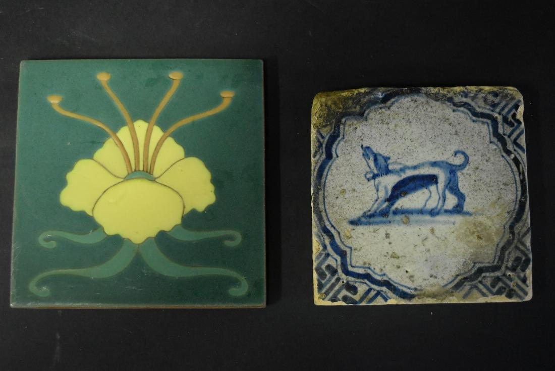 Two(2) Decorative Ceramic Tiles: Including: early Dutch Delft tile. Dog decoration, 5.25in. Square; Van Briggle Arts & Crafts tile. Daffodil decoration, 6in.square