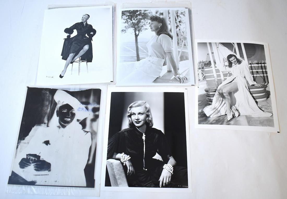 Ginger Rogers Photographs and Negatives (7): Pin-up photograph; Glamour publicity photo; high style negative in fashionable hat; girl next door photo with negative; glamour fashion photo with negative; Seven in the lot. All 8 x 10