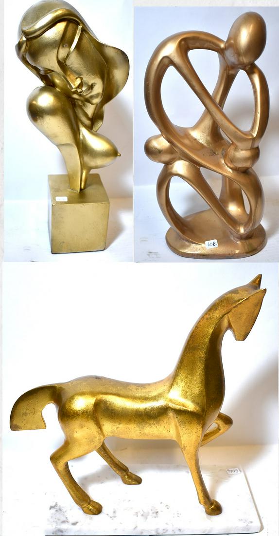 Collectors Lot of MCM Sculpture (3): Dore Bronze Sculpture of a Horse on a marble base; a gilded pottery sculpture of intertwining figures and a carved wooden gilded sculpture of a woman. 12 H 12 L; 15 H and 17H Three sculptures in the l