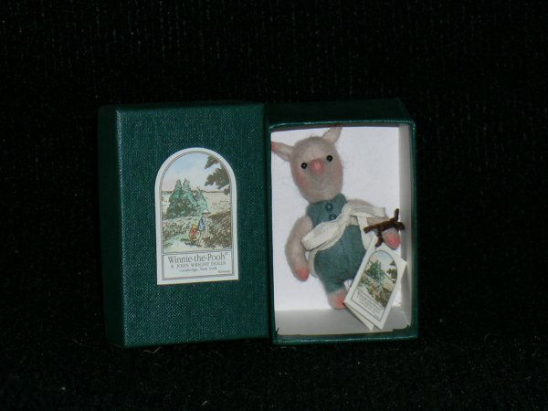 R. John Wright, Pocket Piglet: Pocket Piglet by R. John Wright, 2-3/4", felt, glass eyes, jointed at neck and shoulders. 1994. Limited Edition 3500