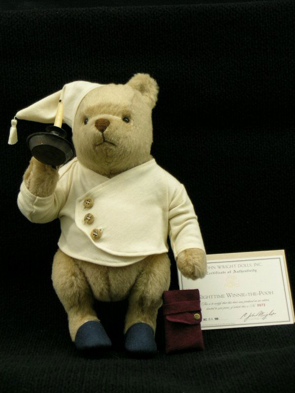 R. John Wright, Nighttime Winnie-The-Pooh: Nighttime Winnie-the-Pooh, 12", mohair plush, fully jointed, cotton nightshirt & cap, felt slippers, tin candlestick. 1998-1999. Limited Edition 2500. With original box.