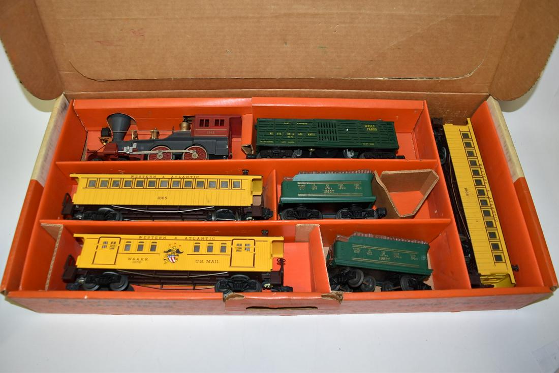 Lionel O Gauge "The General" No.1644 Set - Original Box: Lionel O Gauge "The General" No.1644 Set - Original Box. Including: 1862 locomotive, 1862T Tender(2), 1865 passenger car(2); 1866 Mail Coach, 3370 Wells Fargo Fast Express Gunfight Car