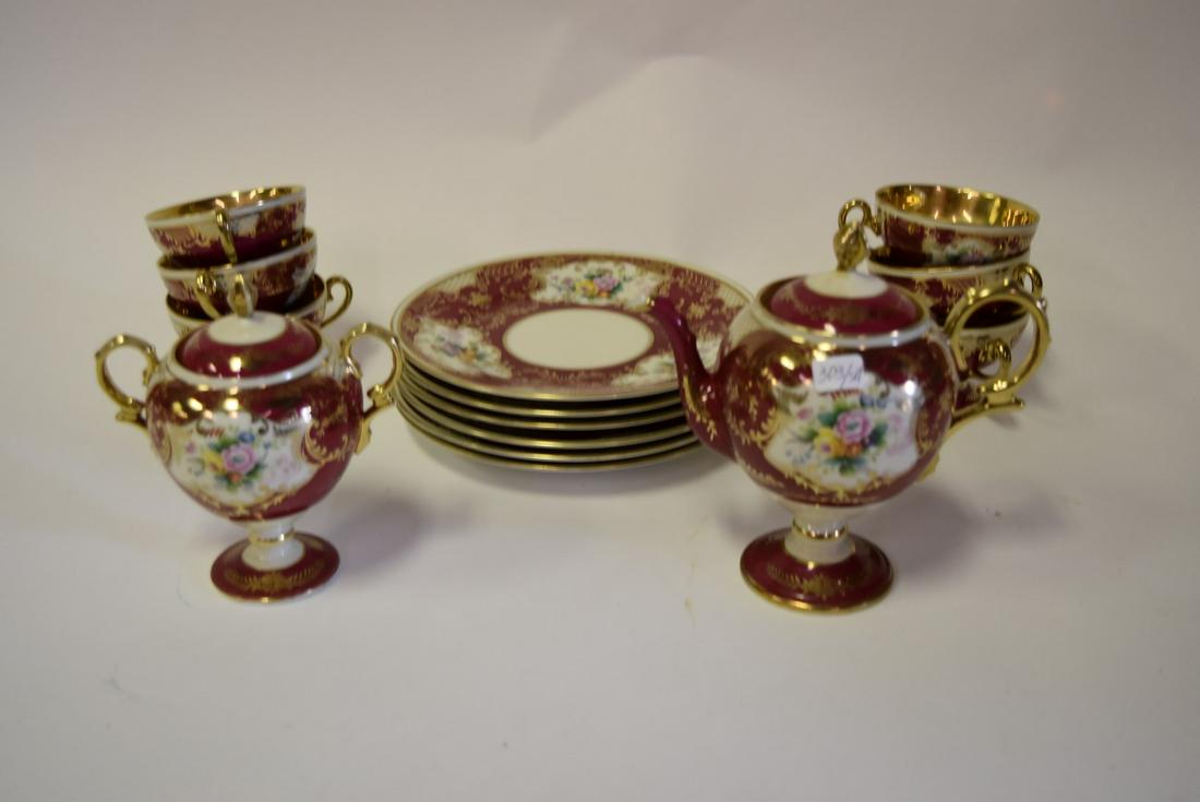 Noritake Porcelain Lustre Tea Service: Hand painted porcelain tea service. Comprised of: teapot, sugar and creamer, six(6) cake plates, six(6) cups, four(4) saucers