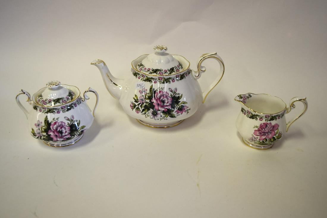 Royal Albert Cotswold Porcelain Tea Set: Hand painted porcelain tea set. Cotswold pattern. Comprised of: teapot, sugar and creamer