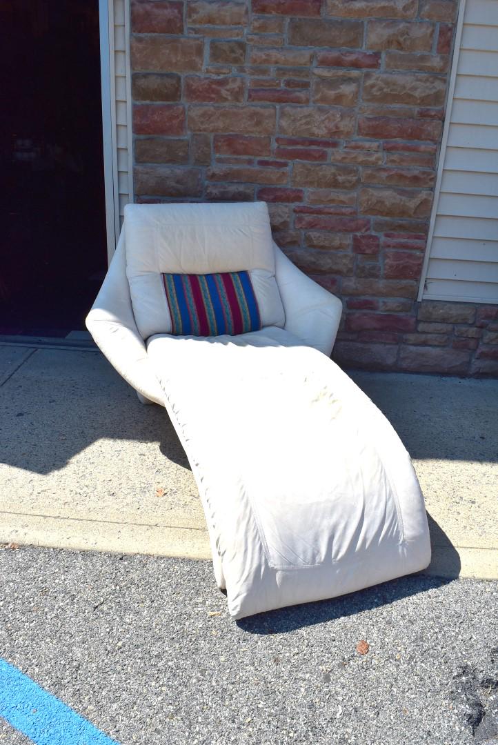 Contemporary Suede Upholstered Chaise Lounge: Off white suede uphosltered chaise; 36in.H. x 58in.L. x 44in.W.