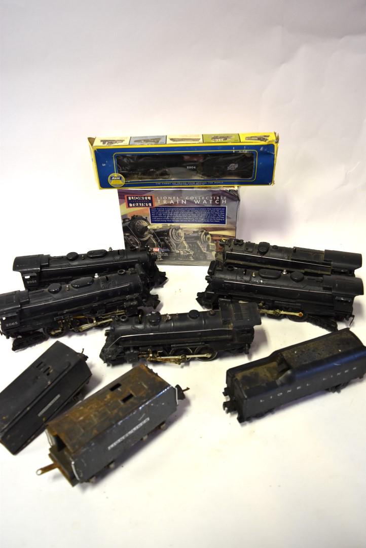 Box Lot of Lionel Engines, Tenders, Etc: Including: 224, 671, 2055, 2065(2), 265W,2046W, 2689W, Miscellaneous accessories