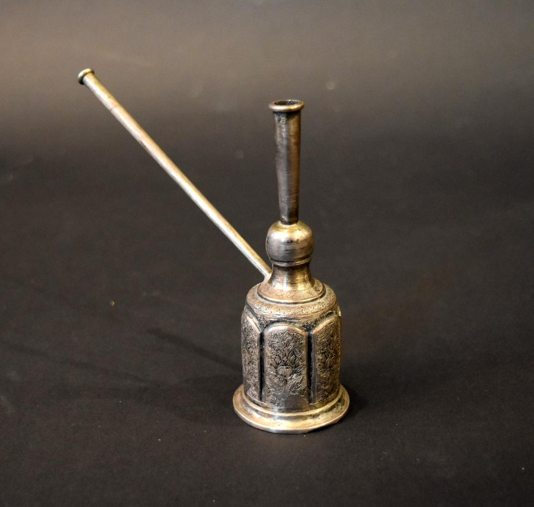 Persian Silver Opium Pipe: Persian silver opium pipe. Hand chaised decorated panels; 5in.H. x 5in.W.
