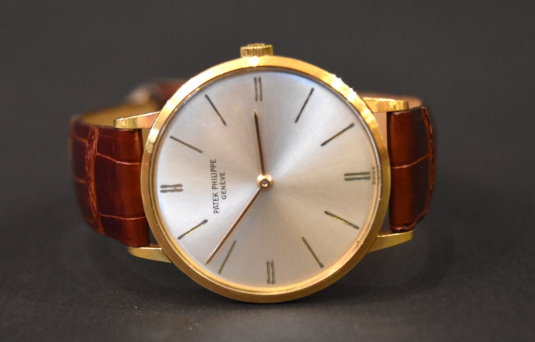 Patek Philippe 18K Gold Men: Patek Philippe 18K Gold Men's Watch. 32mm. Brown leather band