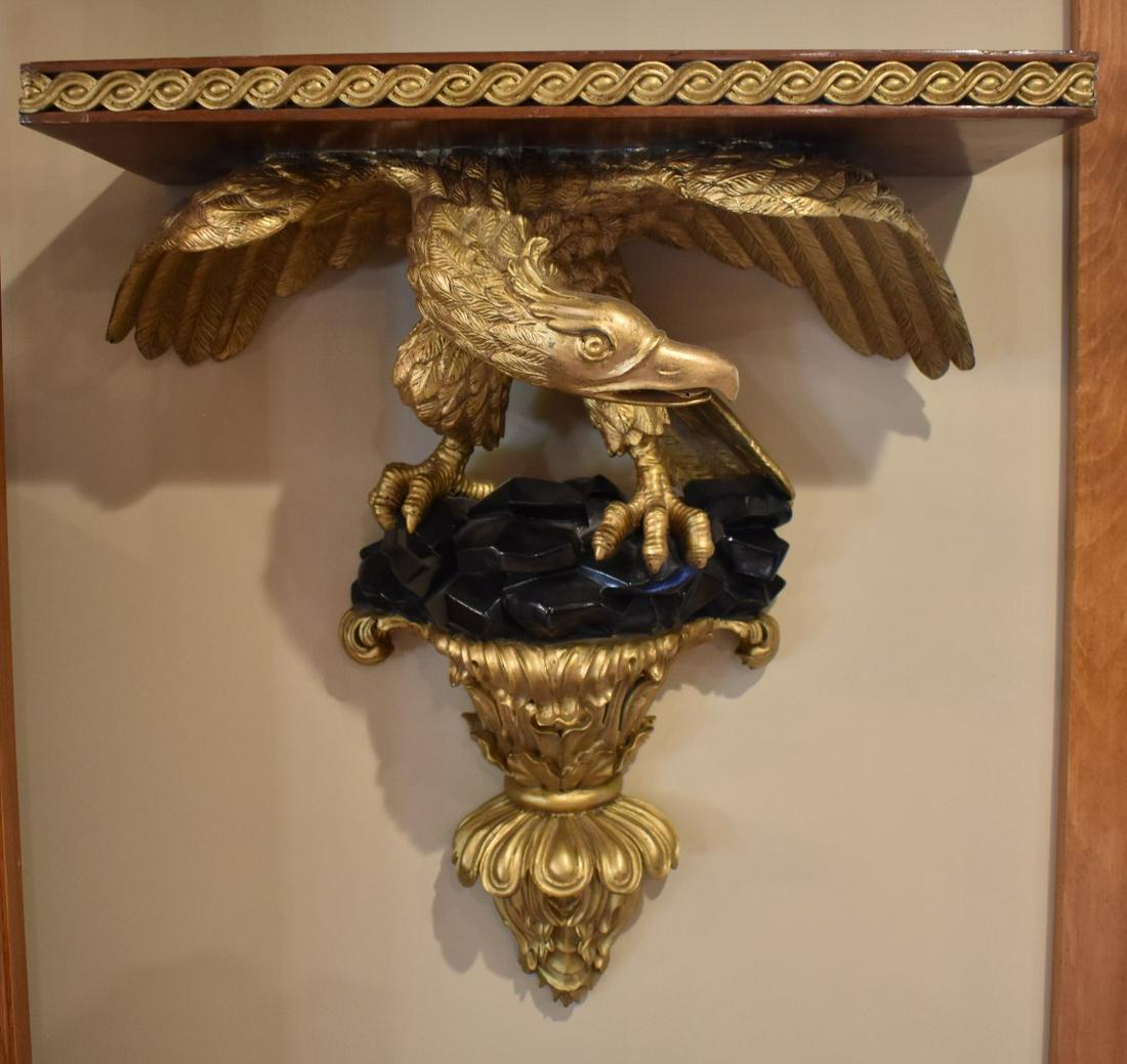 19th C. Carved Eagle Wall Shelf: Wings of a figural eagle on gessoed base supports the wall shelf. 24"H. x 21"W x 10"D