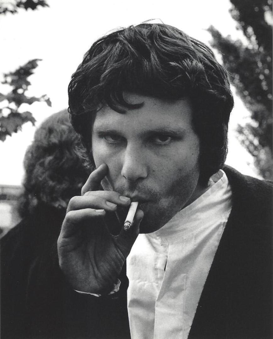 Jim Morrison Jim Marshall Publication Photo: Jim Morrison Jim Marshall Publication Photo Jim Morrison, measuring approximately, 10"x 8" with white border. Taken in 1968 and printed in 1998. It comes stamped by the photographer and agency with ot