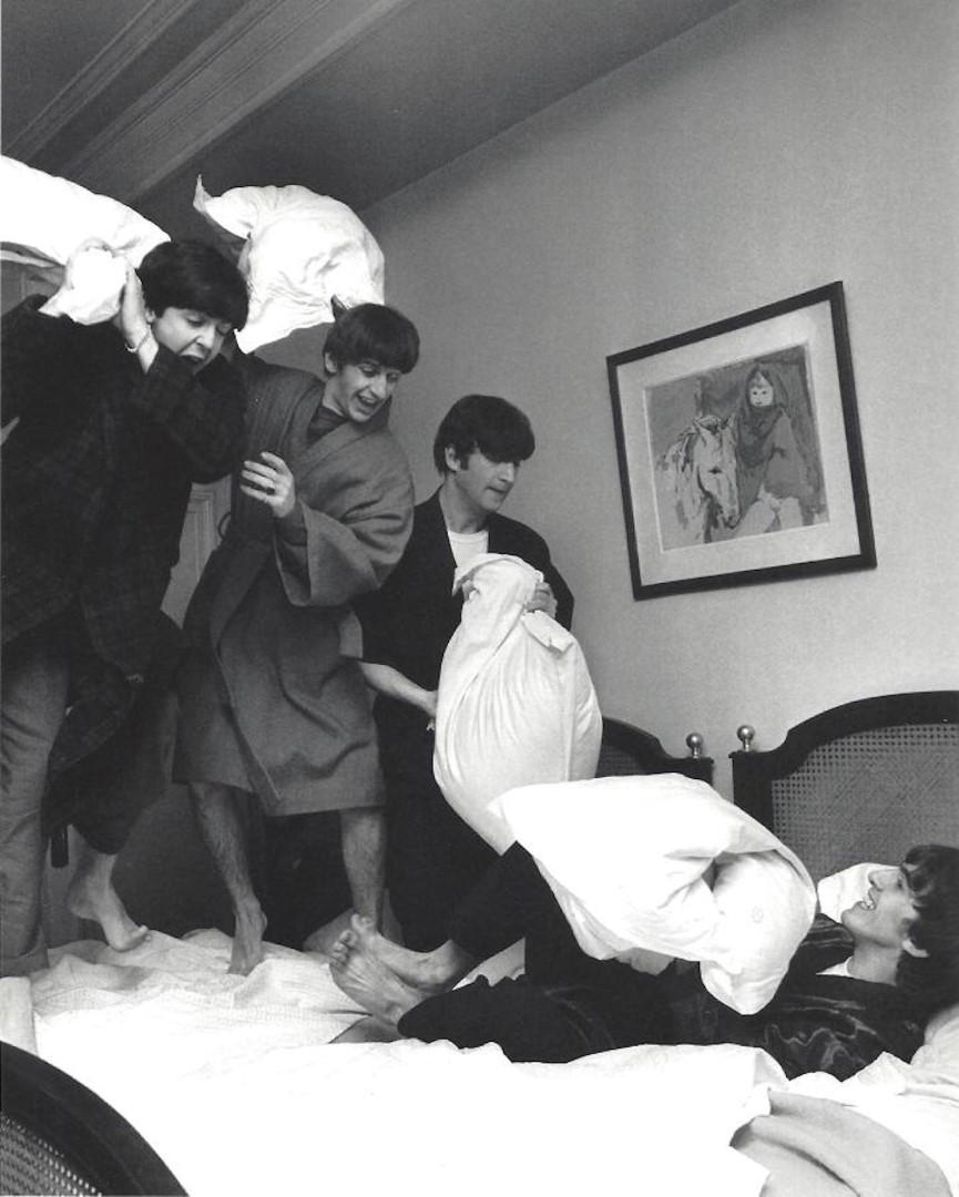 The Beatles Harry Benson Publication Photo: The Beatles, measuring approximately, 10"x8" with white border. Taken by Harry Benson in 1964, printed 1998. It comes stamped by the photographer and agency with other details for publicity that may n