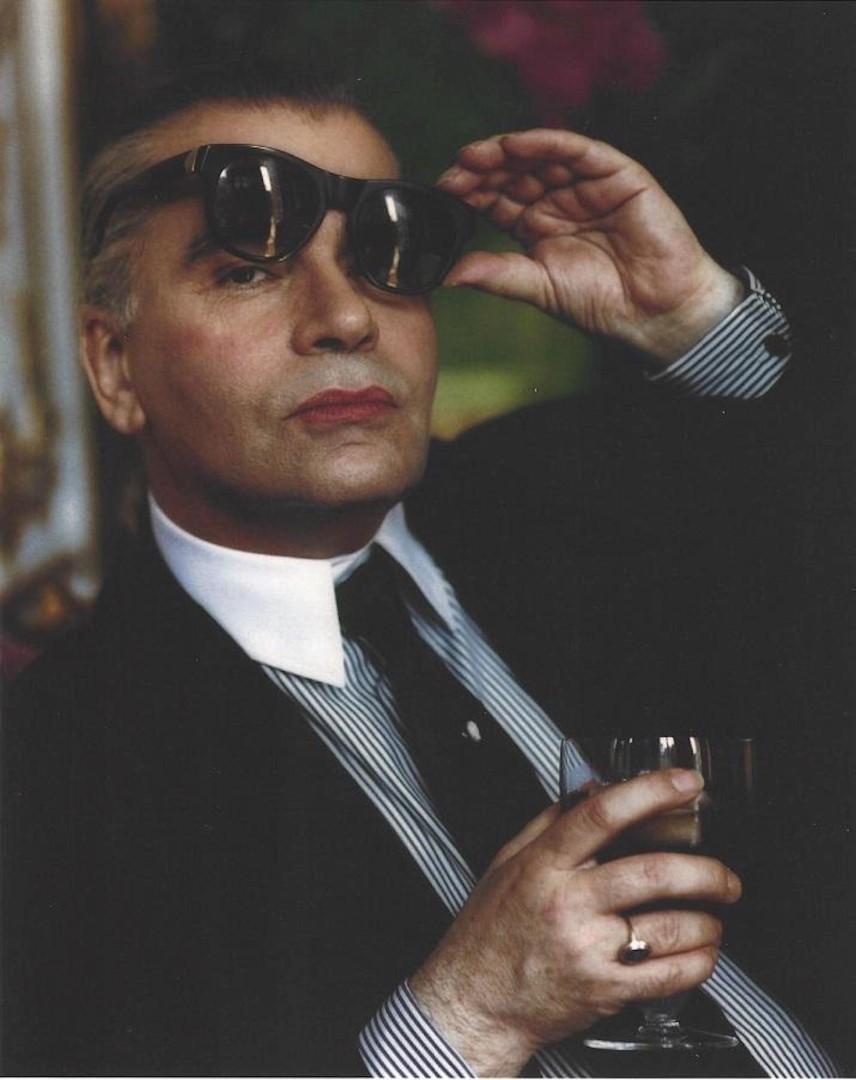 Karl Lagerfeld Helmut Newton Portrait Photo: Karl Lagerfeld, now passed away, measures 10.5"x8.5", inner size, 10"x 8". Photograph has white border. Taken in 1992, this print dated 1998. It comes stamped by the photographer with other details fo