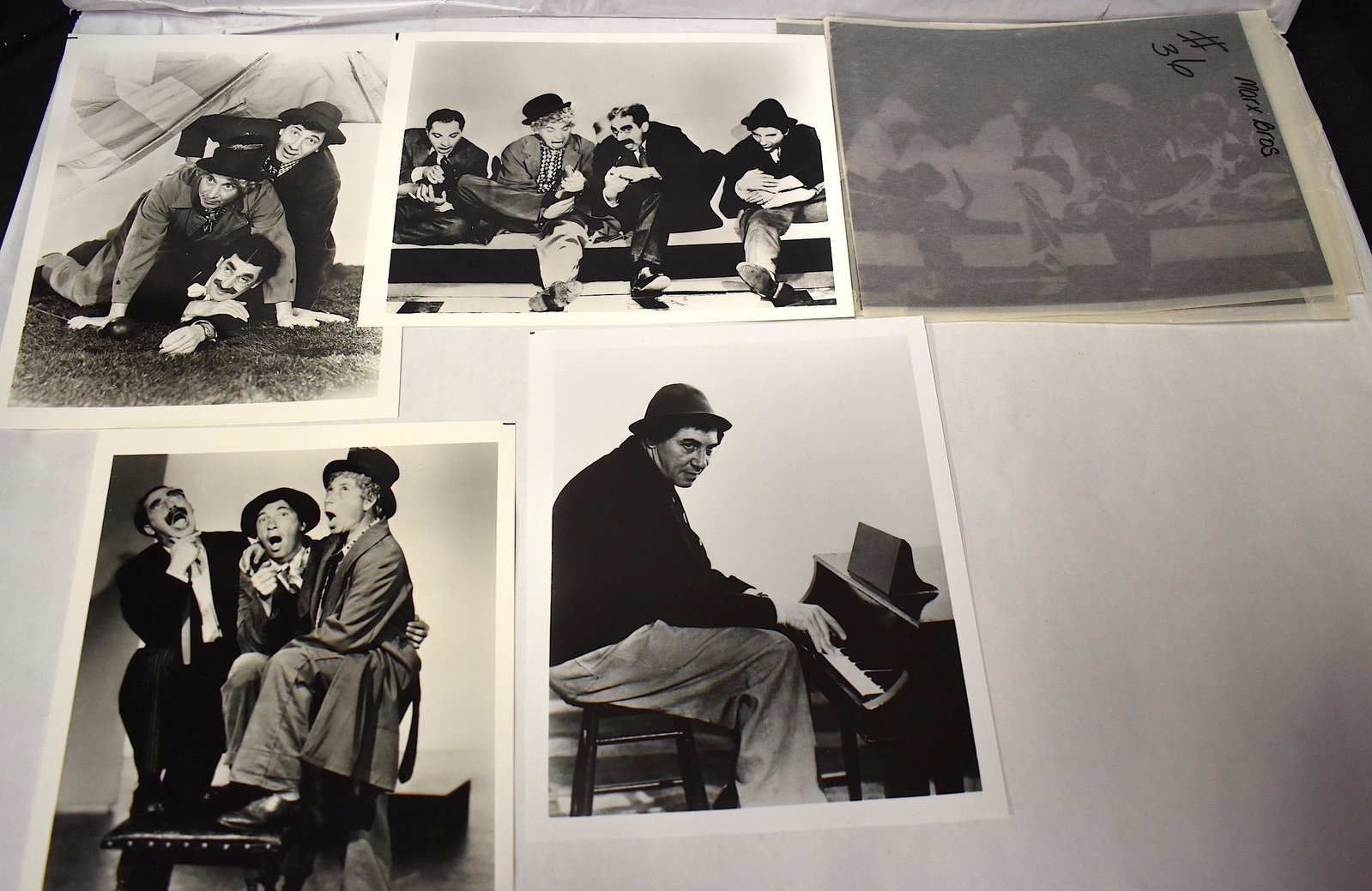Marx Bros, Photographs & Negatives (8): Four amusing photographs inc. one with all four Marx Bros and one with Chico playing the piano, The lot includes the negatives from which they were made Eight items in the lot. All 8 x 10