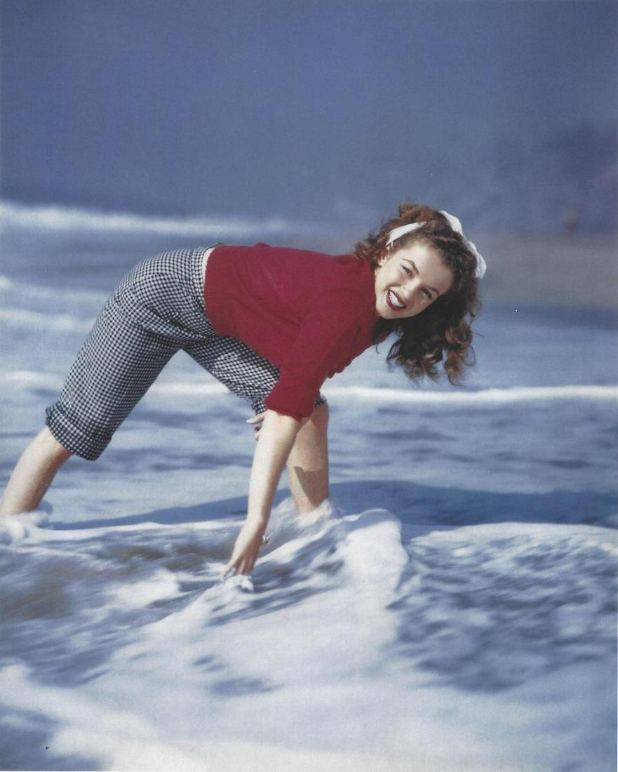 Marilyn Monroe Andre De Dienes Publication Photo: Original Publication Photo, measuring approximately, 10.5"x9" includes white border. Taken in 1945, printed 1999. It comes stamped by the photographer and agency. The photograph is printed on double w