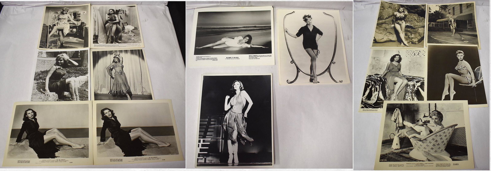 Vintage Original Pin Up Photographs (14)Ê: Includes movie stills for Columbia's Cigarette Girl; MGM's Quo Vadis;Ê United Artists Moulin Rouge; MGM's Clarence; Warner Bros. Desert Song, some with publicity snipes Fourteen in the lot 8 x 10