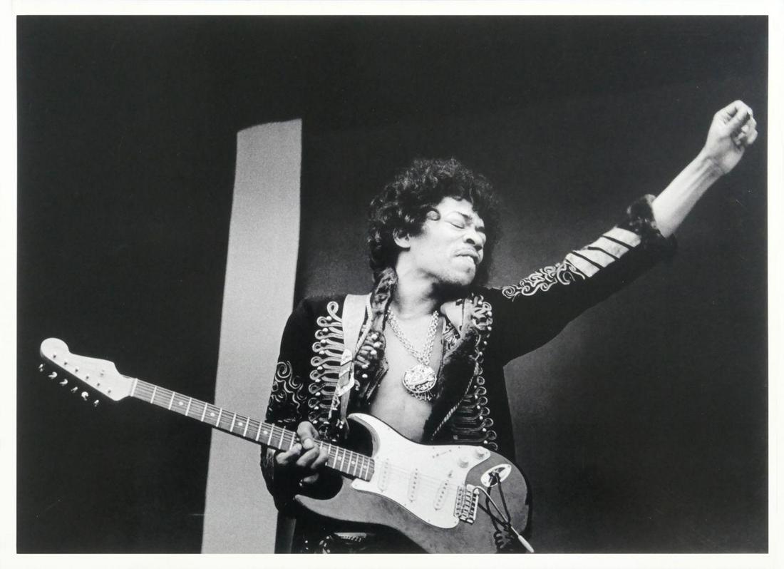 Jimi Hendrix Jim Marshall Publication Photo: Original Publication Photo, measuring approximately, 12"x16" includes white border. Taken in 1968, printed 1998. It comes stamped by the photographer and agency. The photograph is printed on double we