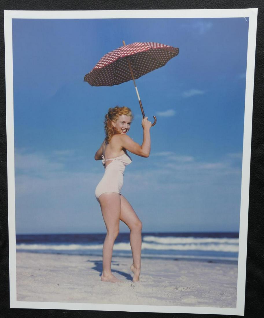 Marilyn Monroe Andre De Dienes Publication Photo: Original Publication Photo, measuring approximately, 16"x12" includes white border. Taken in 1945, printed 1999. It comes stamped by the photographer and agency. The photograph is printed on double we