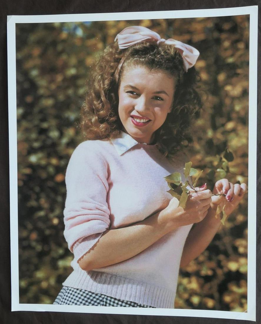 Marilyn Monroe Andre De Dienes Publication Photo: Original Publication display Photo, measuring approximately, 16"x13" includes white border. Taken in 1945, printed 1999. It comes stamped by the photographer and agency. The photograph is printed on d