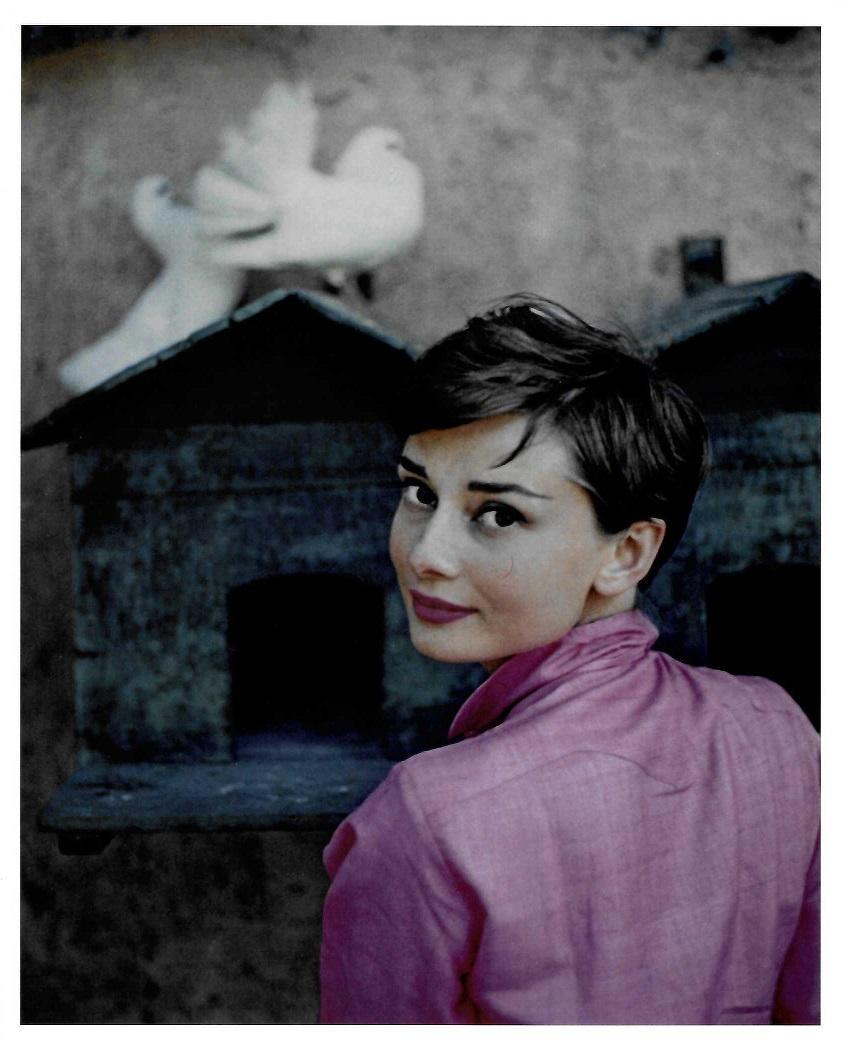 Audrey Hepburn Philippe Halsman Publication Photo: Original Publication Photo, measuring approximately, 10.5"x9" includes white border. Taken in 1966, printed 1998. It comes stamped by the photographer and agency. The photograph is printed on double w